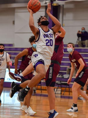 Topeka West's Trevion Alexander couldn't miss in the Chargers' 91-64 win over Seaman on Tuesday night. Alexander hit all eight shots and all four free throws for a game-high 22 points.