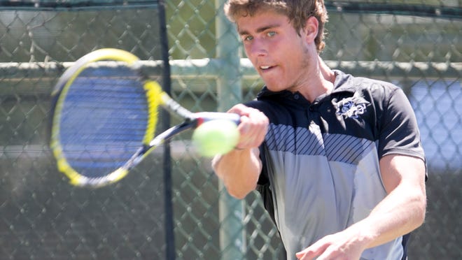 
May 3, 2014 - Estrella Foothills’ Max Schell returns a hit in winning the Division III singles state championship at Paseo Racquet Center in Glendale.
