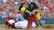 Aug. 26: Reds catcher Tucker Barnhart tags out Pirates