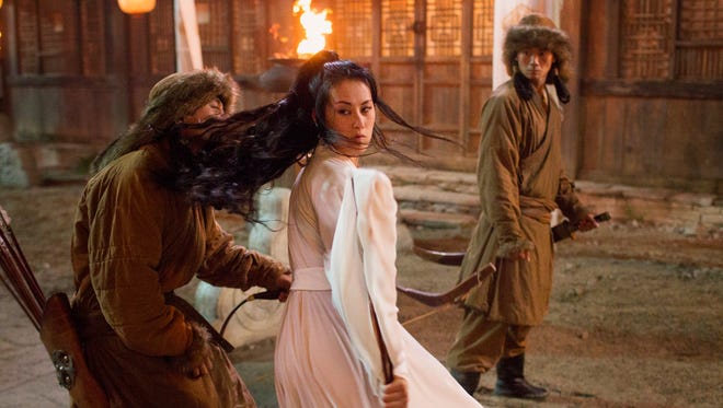 Olivia Cheng, in white, plays Mei Lin in Netflix's 'Marco Polo.'