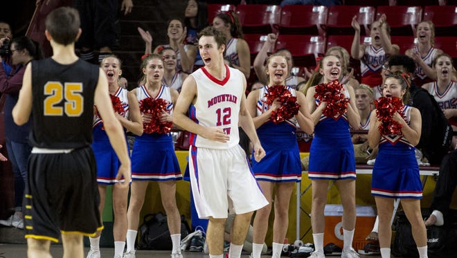 Mountain View  junior guard Tommy Kuhse celebrates during the boys basketball quarterfinals at Wells Fargo Arena last season.
