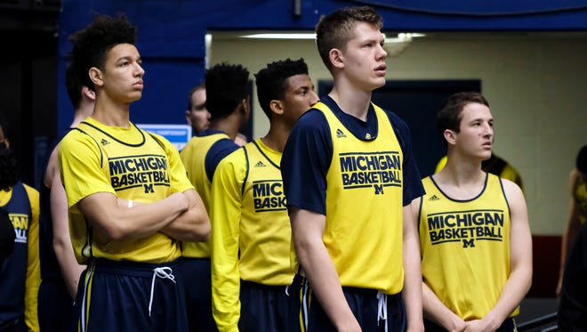 Michigan players wait to take the court during a practice day Tuesday, March 15, 2016, at Dayton Arena.