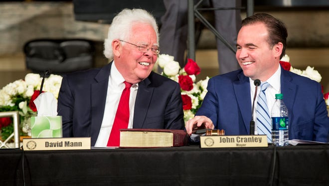 Council member David Mann and Mayor John Cranley share a laugh during the inaugural session of the city council Music Hall Ballroom Tuesday, January 2, 2018. 