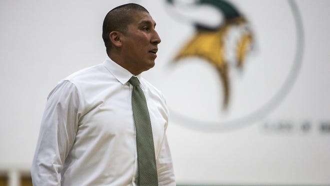 Sunnyslope head coach Ray Portela watches during the second half against Apollo on Tuesday, Jan. 16, 2018 at Sunnyslope High School in Phoenix.