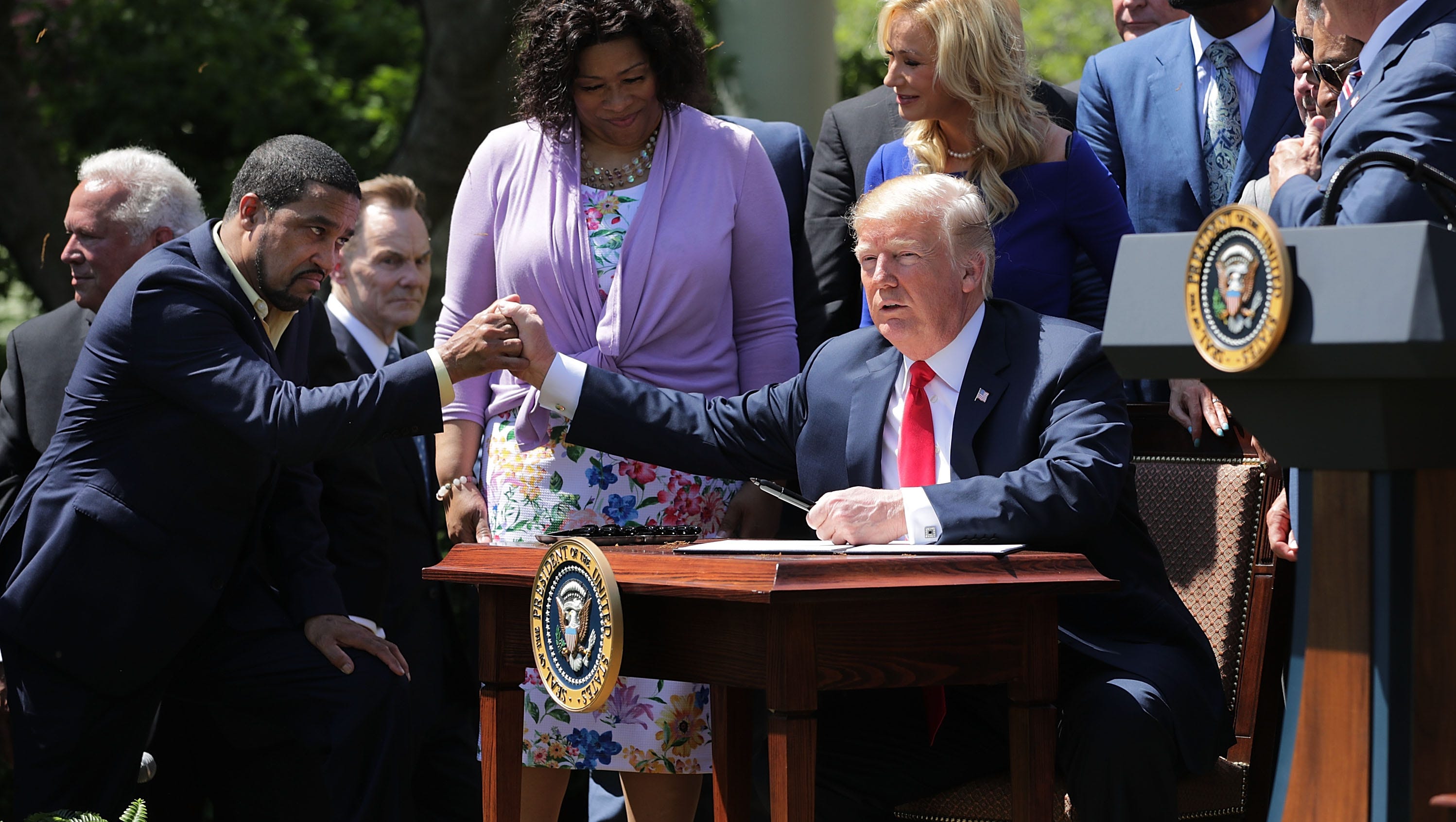 Trump signs executive order giving more freedom to federally funded religious groups