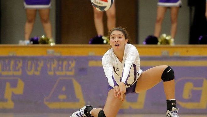 Volleyball action from earlier this year involving El Paso and Burges.