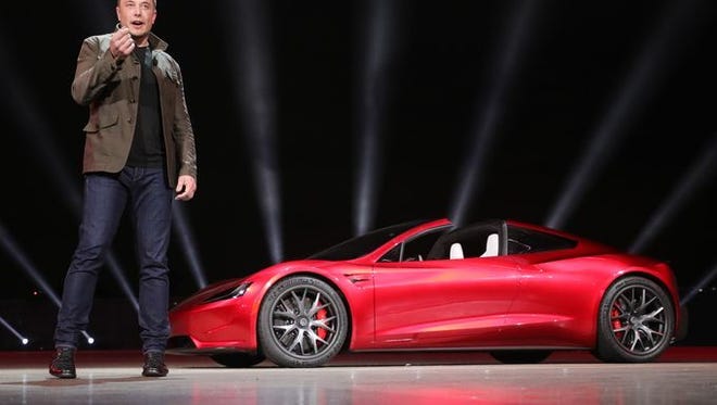 A spotlight Elon Tesla Roadster: World's longest road trip