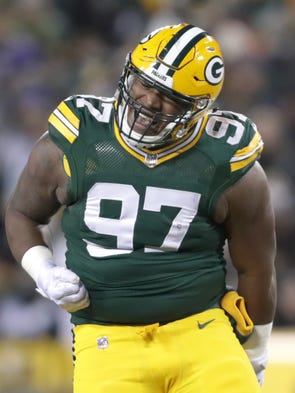 Green Bay Packers nose tackle Kenny Clark reacts to
