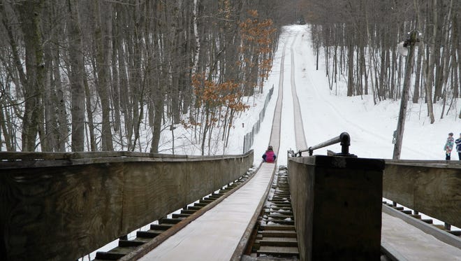 Up to three or four people can fit on a toboggan at Midland's City Forest.