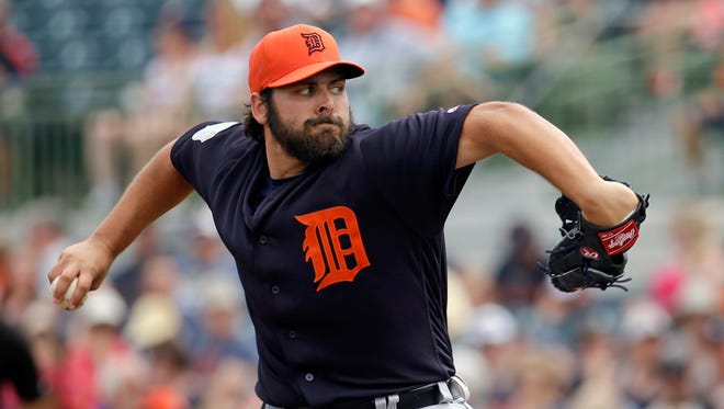 Detroit Tigers' Michael Fulmer pitches against the Houston Astros in the first inning of a spring training baseball game, Friday, March 11, 2016, in Kissimmee, Fla.