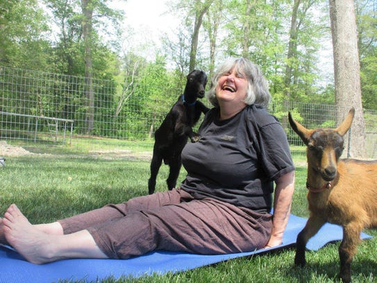 Judy Kirpich's face says it all during a yoga session