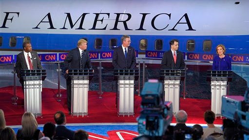 The candidates stand behind their podiums  during the CNN Republican presidential debate at the Ronald Reagan Presidential Library and Museum, Wednesday, Sept. 16, 2015, in Simi Valley, Calif. (AP Photo/Mark J. Terrill) 
