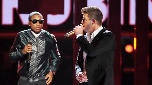 Pharrell Williams, left, and Robin Thicke perform at the BET Awards in 2013.