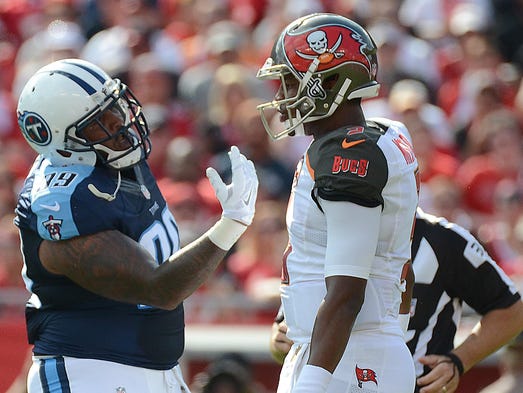 Titans defensive linemen Jurrell Casey (99) talks to