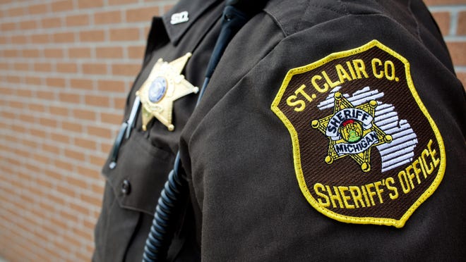 A St. Clair County Sheriff’s Deputy’s badge and uniform patch. A St. Clair County Sheriff's Deputy's badge and uniform patch.