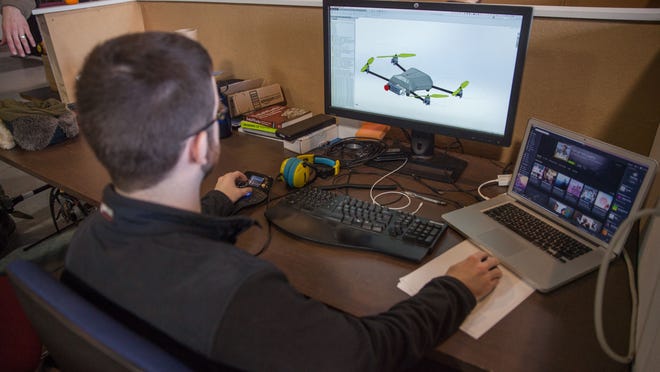 AirShark’s Ian Ray reviews his design for an all-weather drone in early January 2015 at Burlington's Generator makerspace.