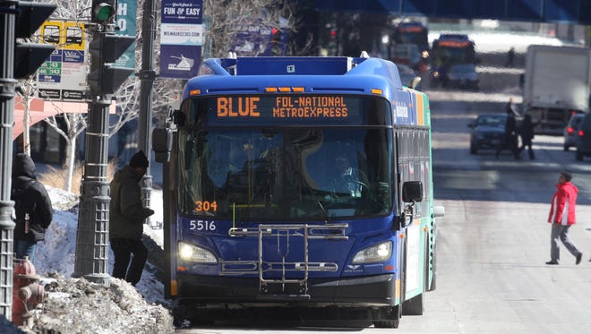 The Milwaukee County Transit System's Blue Line operates along the busy Wisconsin Ave. corridor (shown here) and ends on the northwest side of the city. A special shuttle service extends from a Blue Line stop at Park Place to employers in Menomonee Falls.