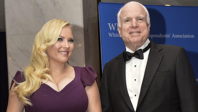Republican Sen. John McCain of Arizona and daughter Meghan McCain arrive at the White House Correspondents' Association annual dinner in Washington on May 3, 2014.