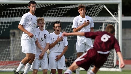 Valhalla defenders get ready to block a penalty kick from Albertus Magnus' Joe Michalak (6) during the Westchester vs Rockland boys soccer challenge at Lakeland High School in Shrub Oak Sept. 26, 2015. Valhalla won the game 3-2.