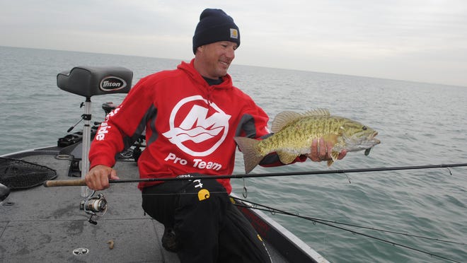Gerry Gostenik shows off a dandy smallmouth.