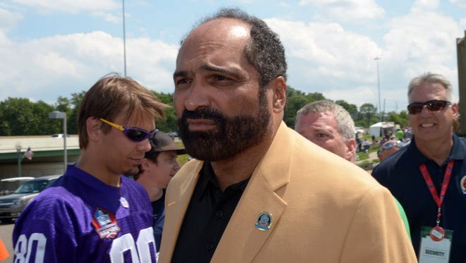 This file photo shows Franco Harris at the 2013 Pro Football Hall of Fame Enshrinement at Fawcett Stadium in Canton, Ohio on Aug. 3, 2013.