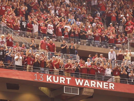Kurt Warner was inducted into the Arizona Cardinals Ring of Honor at first time during Monday Night Football on Sept. 8, 2014 at University of Phoenix Stadium in Glendale, Arizona.