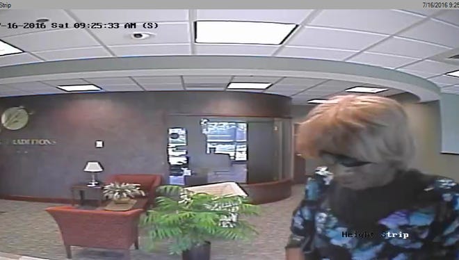 York Area Regional Police released this photo of a man, dressed as a woman, who robbed a bank on Saturday morning.