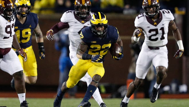 Part of Michigan's success in the power run game can be attributed to Karan Higdon, who rushed for 200 yards against Minnesota on Saturday at Michigan Stadium.