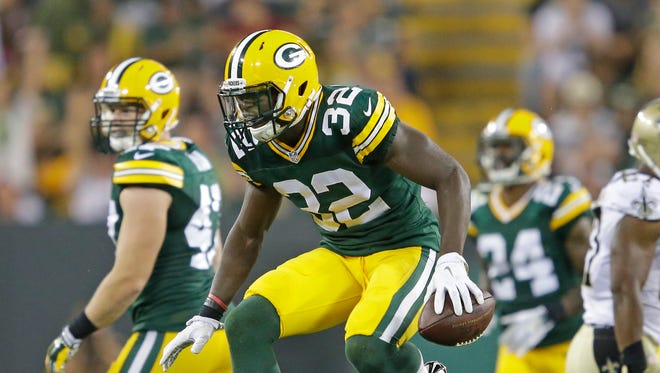Green Bay Packers strong safety Chris Banjo (32) celebrates his touchdown against New Orleans Saints Thursday, September 3, 2015, at Lambeau Field in Green Bay, Wis.