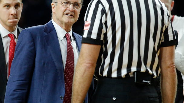 Oklahoma head coach Lon Kruger confronts an...
