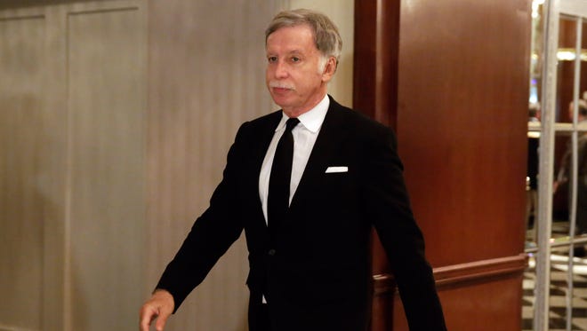 FILE - In this Oct. 7, 2015, file photo, St. Louis Rams owner Stan Kroenke walks in the hallway during a break of National Football League owners meeting, in New York. Monday, Jan. 4, 2016, is the first day for teams to apply for relocation and St. Louis Rams owner Stan Kroenke wants to move the franchise to Los Angeles. (AP Photo/Richard Drew, File)