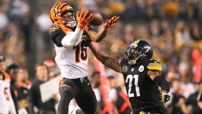 Cincinnati Bengals wide receiver Cody Core (16) is unable to come down with a deep pass as Pittsburgh Steelers cornerback Joe Haden (21) defends in the third quarter during the Week 7 NFL game between the Cincinnati Bengals and the Pittsburgh Steelers, Sunday, Oct. 22, 2017,  at Heinz Field in Pittsburgh. 