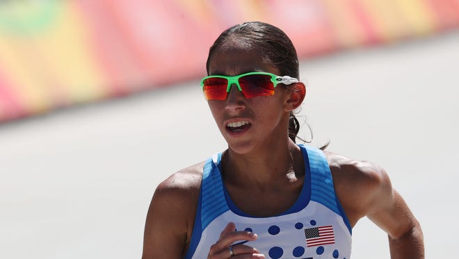 Aug 14, 2016; Rio de Janeiro, Brazil; Desiree Linden (USA) during the women's marathon in the Rio 2016 Summer Olympic Games at Sambodromo.