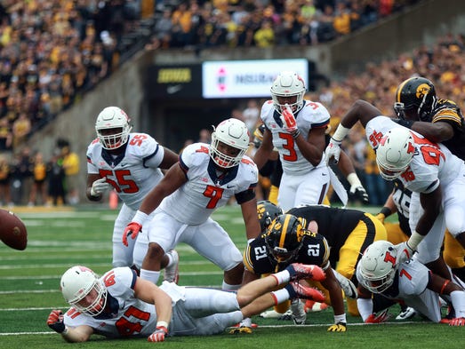 Iowa's Ivory Kelly-Martin fumbles the ball during the