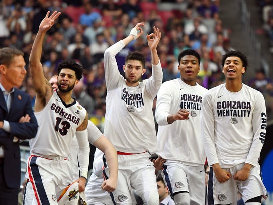 Gonzaga Bulldogs bench reacts during the second half
