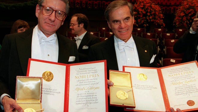American Nobel Prize for Medicine co-winners Alfred Gilman left and Martin Rodbell right. Gilman, 74, died in Dallas last week.