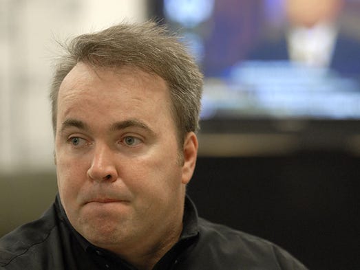 Green Bay Packers coach Mike McCarthy looks on inside