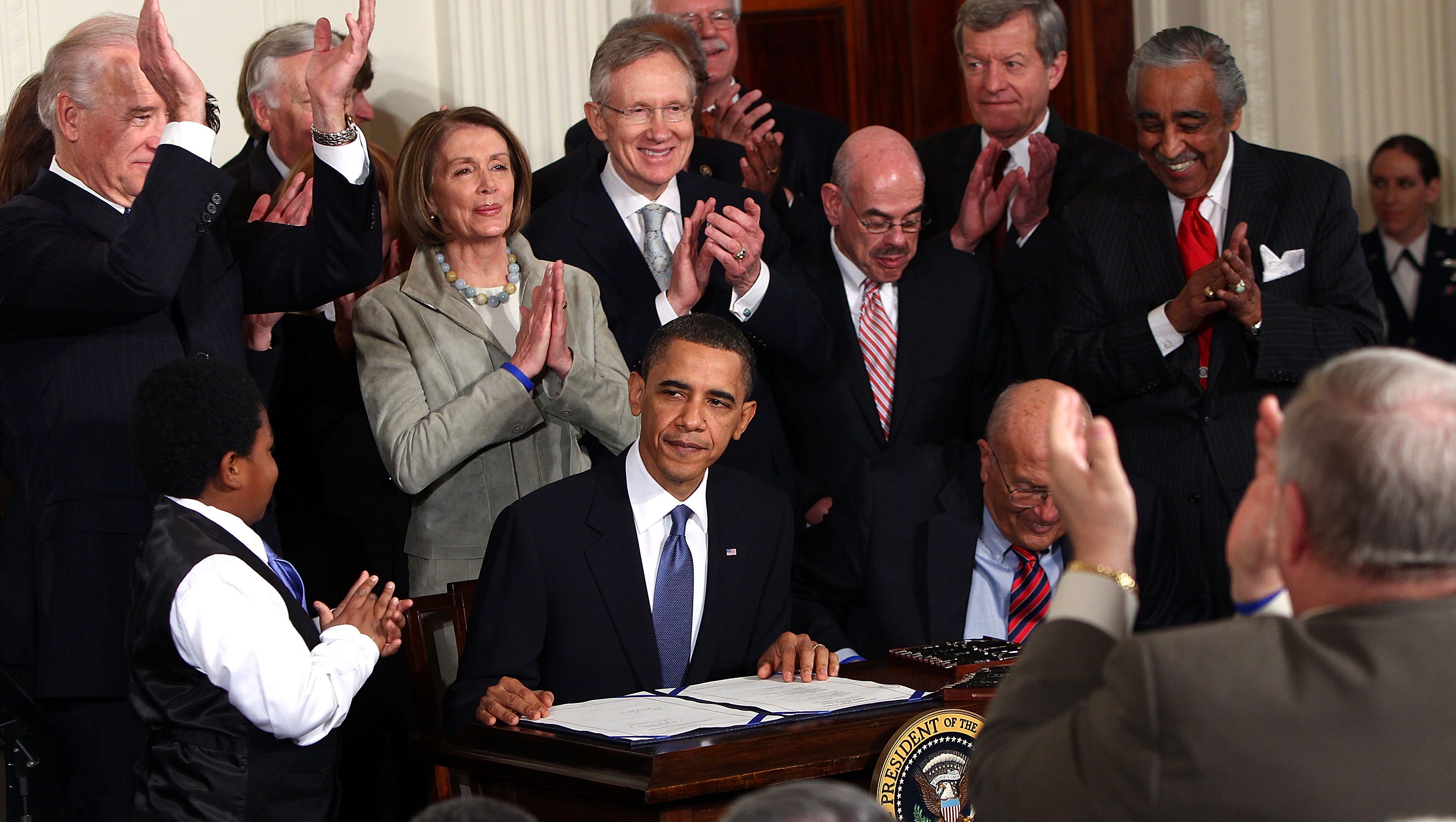 Obama signs 14th bill making changes to Obamacare