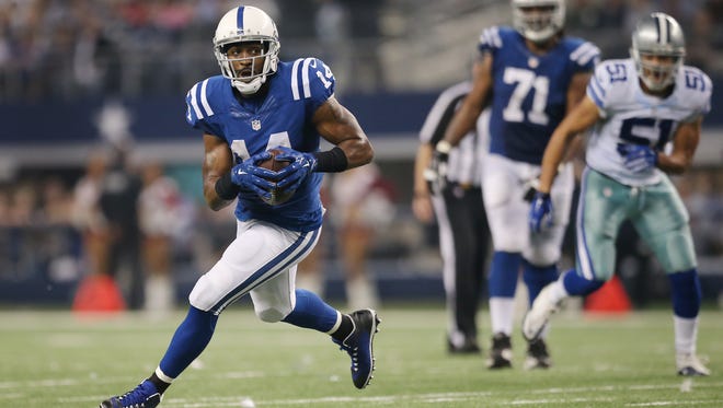 Colts wide receiver Hakeem Nicks looks for running room after a second half reception in Dallas on Sunday.