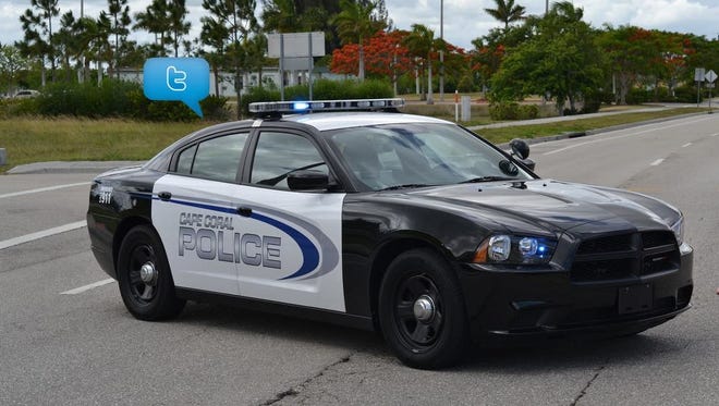 A Cape Coral Police Car with a Twitter "chat bubble" overhead.