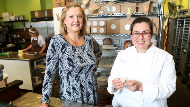 Les Dames d'Escoffier club president Jamie Estes, left, and Cake Flour owner Claudia Delatorre inside Delatorre's Louisville bakery. Both women are enjoying the newly formed group and the opportunities it is offering women with food related interests. "For me, it's about being around a great group of women, learning from them, being inspired and hoping to inspire," Delatorre said. "It's giving small business owners a network and allowing them to impact the community," Estes added. "There's a lot of need out there." March 24, 2016