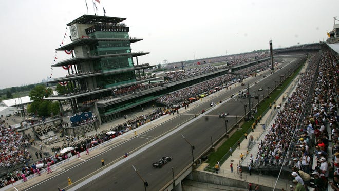 Indianapolis 500 drivers head around the track at the start of the 93rd running of the Indianapolis 500 Mile Race at the Indianapolis Motor Speedway in Speedway, Sunday, May 24, 2009 before the race. 