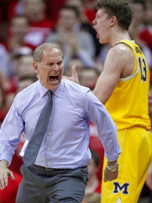 Michigan coach John Beilein disputes a call during the second half of U-M's 68-64 loss to Wisconsin Tuesday in Madison, Wis.