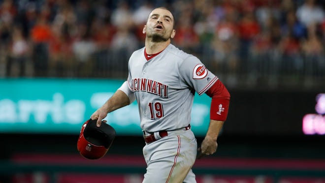 Cincinnati Reds' Joey Votto yells to the Washington Nationals' dugout as he walks off the field during the eighth inning of the second baseball game of a doubleheader at Nationals Park, Saturday, Aug. 4, 2018, in Washington. Votto was hit by a pitch after Washington Nationals' Bryce Harper and Spencer Kieboom were hit by pitches. The Nationals won 6-2.