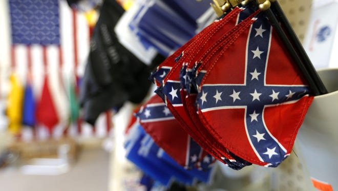 Confederate flags for sale at Ozark Flag Distributors on Battlefield Road on Tuesday.