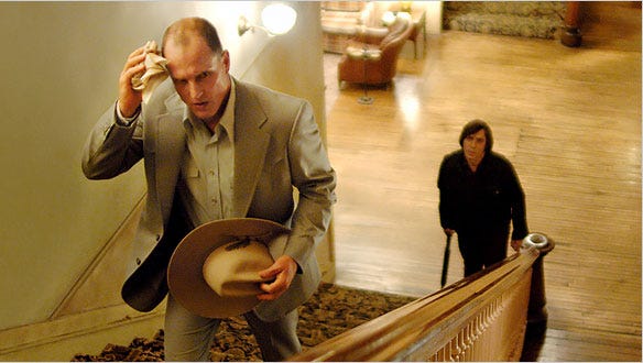 Woody Harrelson is persued by Javier Bardim in the movie "No Country for Old Men."
