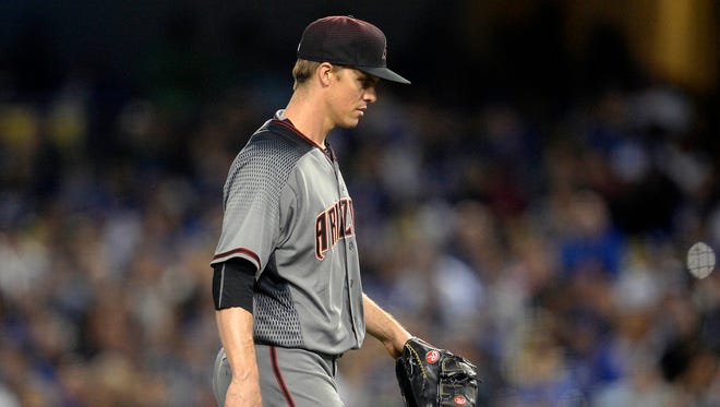 Arizona Diamondbacks starting pitcher Zack Greinke (21) reacts during the fifth inning against the Los Angeles Dodgers at Dodger Stadium, April 14, 2017.