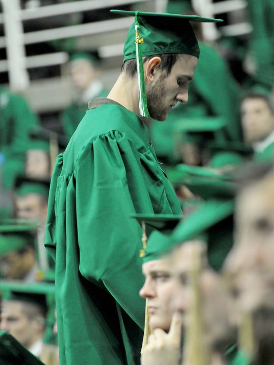 MSU students turn backs on George Will at commencement MSU students turn backs on George Will at commencement