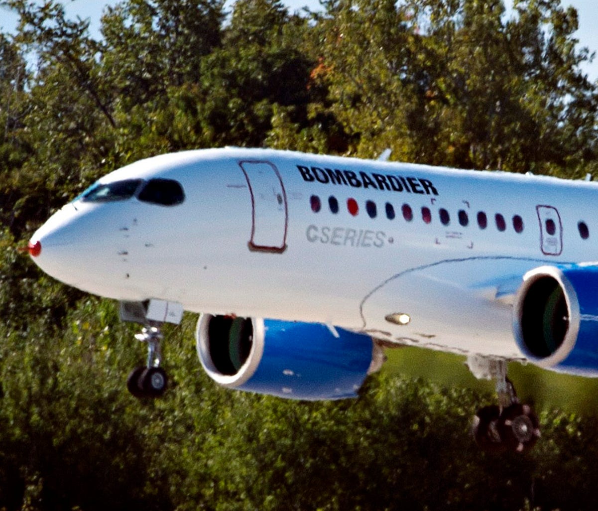 Bombardier's new CSeries jetliner takes off on its maiden flight on Sept. 16, 2013, in Mirabel, Quebec.