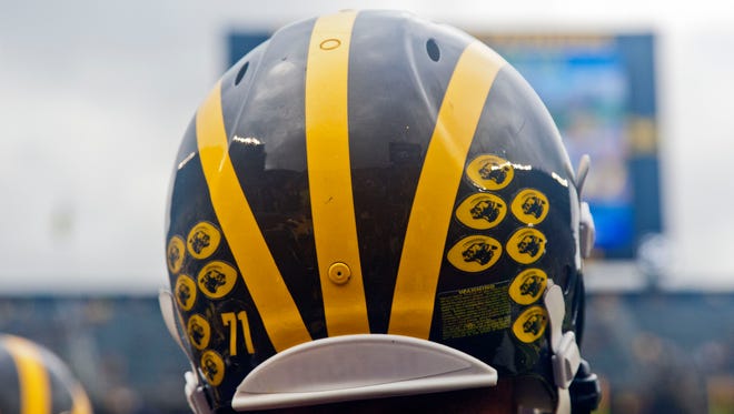 A Michigan helmet before a game against UNLV on Sept. 19, 2015.